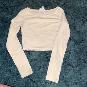 Size small light yellow long sleeve crop top.